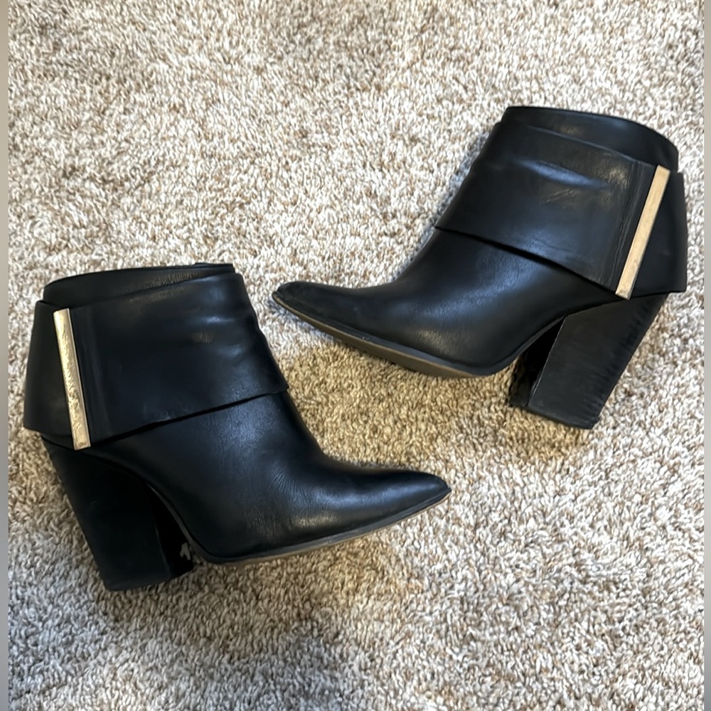 Black leather ankle boots with heel & gold accent!